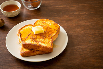French toasted with butter and honey