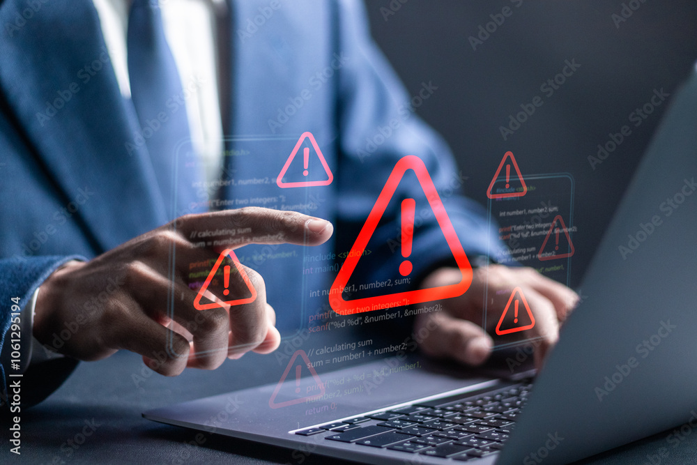 Wall mural ransomware malware attack and data breach. businessman using laptop with spam virus on warning cauti