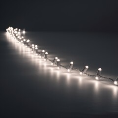 Decorative white LED string lights glow brightly, providing festive illumination across a continuous line on a dark, minimalist background.