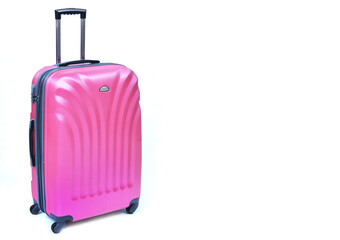 Pink travel luggage isolated on the white background copy space