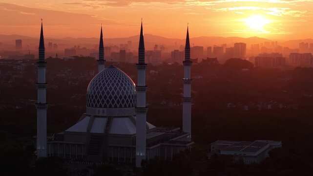 malaysian mosque Masjid Sultan Salahuddin Abdul Aziz Shah during beautiful sunrise aerial shot