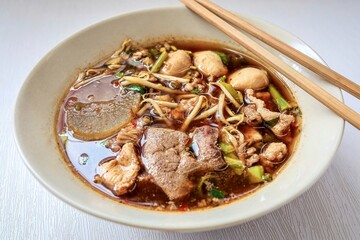 Noodle soup with sliced pork, pig blood, bean sprouts and Thai morning glory., thai called Kway Tiew Moo Nam Tok
