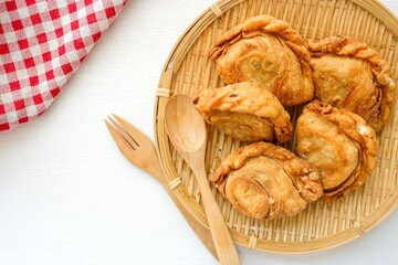 curry puff , karipap on white background	