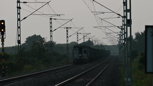 Beautiful view of Indian railway track in India. Indian Railways Diesel-Electric Multiple Unit train