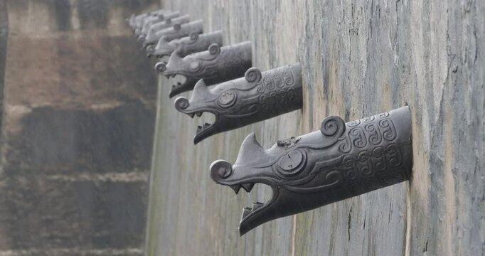 Rain in Forbidden City. Dragon water spout