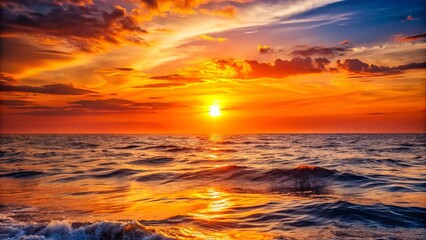 Obraz premium Breathtaking Sunset at Sea with Vibrant Orange Sky, Tranquil Water, Calm Waves, Scenic Horizon, Natural Beauty, Serene Atmosphere, Ideal for Relaxation and Inspiration