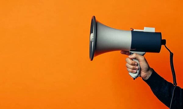 Close-up shot of a hand holding a megaphone with a dynamic pose. Loudspeaker announcement for marketing and sales promotions, Generative AI