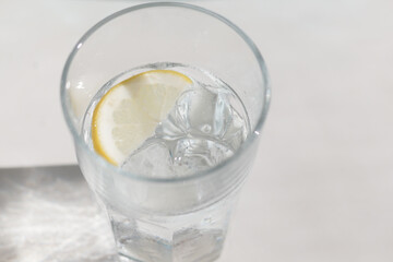 Enjoy a glass of Refreshing Lemon Water served with Ice for a delightful experience