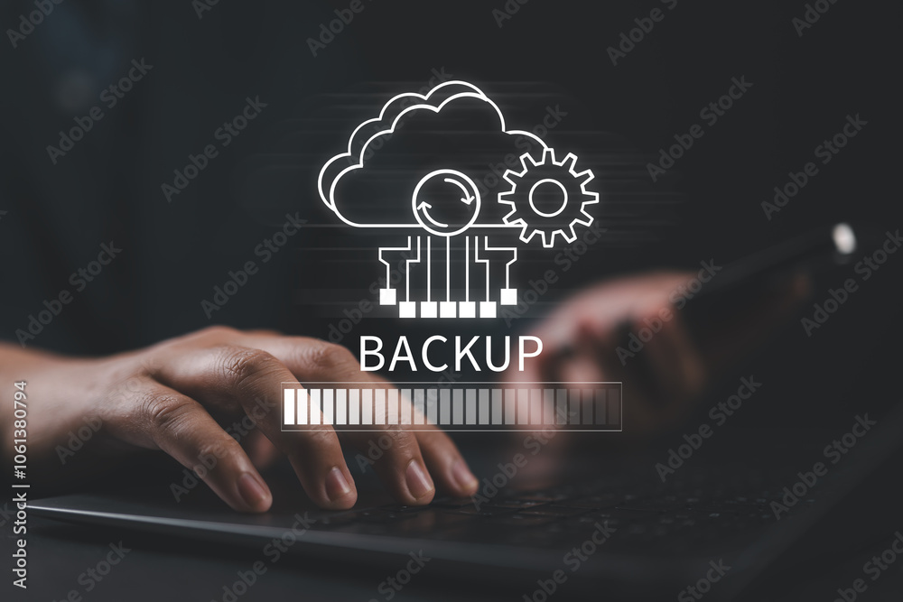 Fototapete Backup concept, Online digital data storage and connection service. Businessman use laptop with Backup status bar for data backup management.