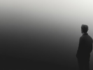 Solitary figure stands against smooth gray gradient background, evoking sense of introspection and calm. minimalist design enhances emotional depth of scene