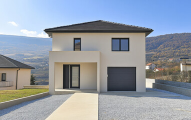 Modern residential house with minimalist design located in a scenic mountainous region