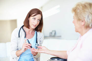 Wheelchair, blood test and medical with old woman and doctor for rehabilitation, sugar level and...