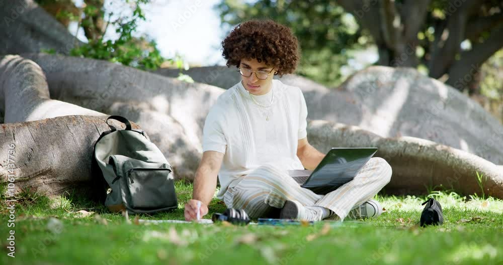Aufkleber laptop, writing and studying with man on grass of campus for university results, student and educati