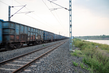 Railway track in India. Indian Railways Diesel-Electric Multiple Unit train