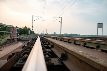 Railway track in India. Indian Railways Diesel-Electric Multiple Unit train