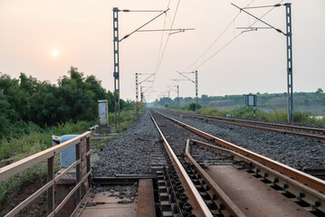 Railway track in India. Indian Railways Diesel-Electric Multiple Unit train