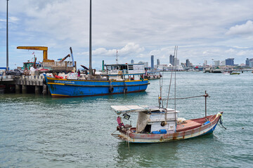 Fishing and cargo boats in Pattaya, Thailand