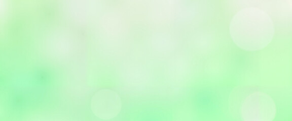 Obraz premium Soft Green Gradient Background with Gentle Bokeh Effect for Tranquil Designs