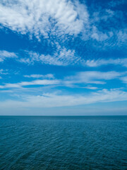Landscape beautiful summer vertical horizon look view point shore open sea beach cloud clean and blue sky background calm nature ocean wave water nobody travel at thailand chonburi sun day time