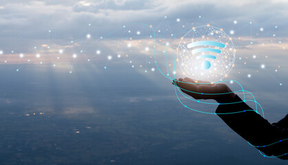 Silhouette hands holding earth network wifi connection, digital network communication and partners concept	
