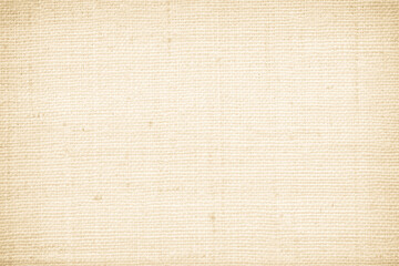 Closeup detail of beige fabric texture background. High resolution photo.