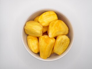 Top view of golden-yellow flesh of ripe jackfruit isolated on the white background. Close up image of jackfruit