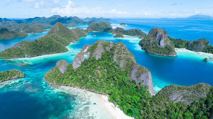 Aerial view of a remote island with limestone karst landscape at Wayag island, Raja ampat, indonesia