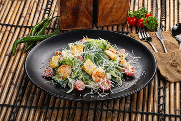 Tasty Caesar salad with prawn