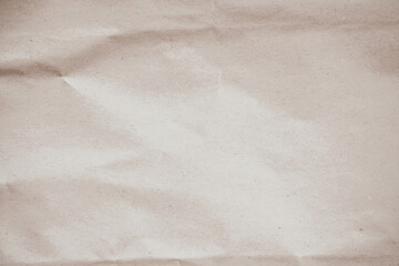 Crumpled brown paper texture background for design with copy space for text or image.
