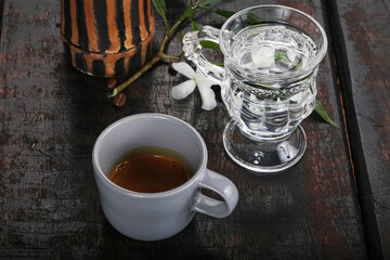 Espresso coffee with cold water