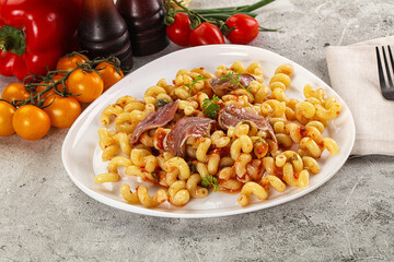 Italian pasta cellentani with anchovy