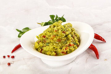 Guacamole with avocado, tomato and chili