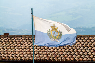 San Marino flag waving on wind © Andrzej