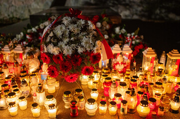 Candles, Red and White Flowers Garland. November 11. World War I Ends, Poland Independence Day, 1918 Remembrance Day. Freedom, Victory, Polish, Narodowe Swieto Niepodleglosci