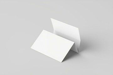 Naklejka premium Minimalistic White Business Card Mockup on Modern Gray Background Evoking Professionalism and Simplicity