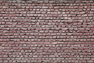 The old bricks are neatly arranged on top of each other. Old brick texture
