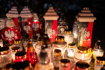 Candles, Red and White Flowers Garland. November 11. World War I Ends, Poland Independence Day, 1918 Remembrance Day. Freedom, Victory, Polish, Narodowe Swieto Niepodleglosci