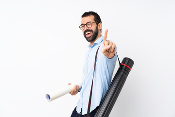 Young architect man with beard over isolated white background showing and lifting a finger