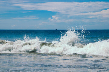 waves crashing on the beach