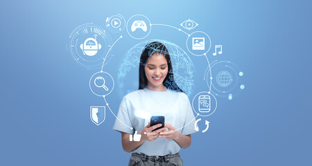 Smiling woman using smartphone with digital icons around, on a blue background, concept of technology and connectivity