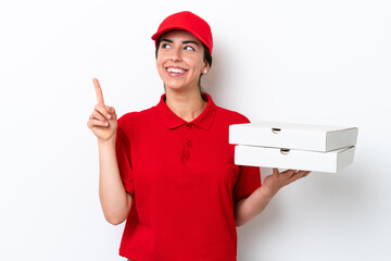 Pizza delivery caucasian woman with work uniform picking up pizza boxes isolated on white...