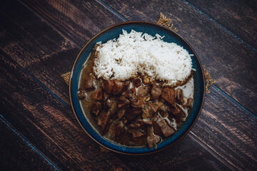 Traditional Czech Dish of Turkey Liver in Brown Sauce with Rice