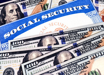 Social Security card is placed on the American flag, background. Social Security for old age people...