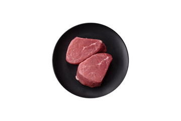 Ribeye steak raw with salt, spices and herbs