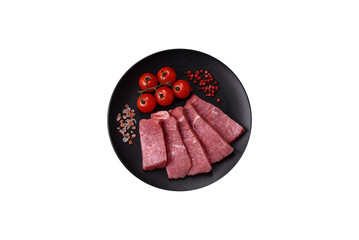 Juicy beef cut into slices with salt, spices and herbs