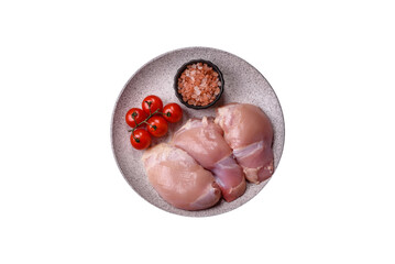 Fresh raw chicken thigh fillets with salt, spices and herbs