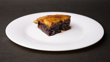 Sweet martabak terang bulan, chocolate peanut pancakes on a white plate