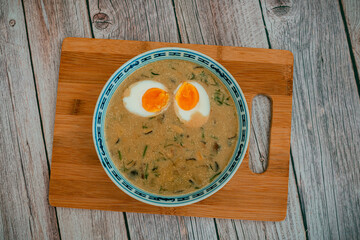Traditional Czech Creamy Mushroom Soup Kulajda with Egg, Potatoes, and Dill