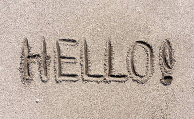 Business hello and welcome concept. Concept word Hello written on beautiful ocean sand beach....