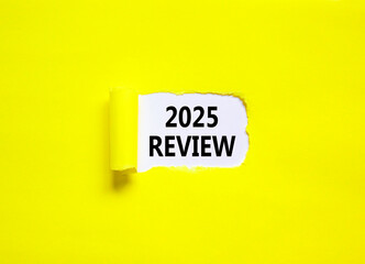 Planning 2025 review new year symbol. Concept words 2025 Review on beautiful white paper. Beautiful yellow paper background. Business 2025 review new year concept. Copy space.